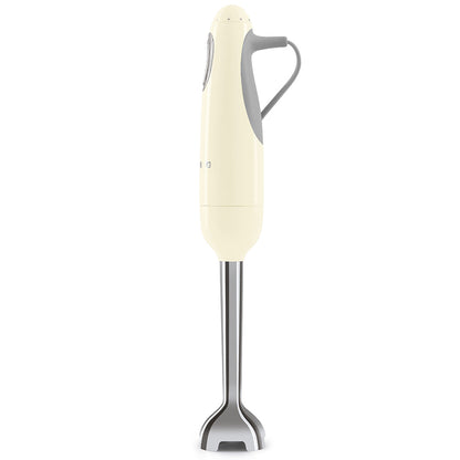 Multifunktionell handmixer med tillbehör Smeg HBF03CREU Kräm 700 W finns hos Nordekko