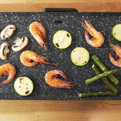Grillplatta Cecotec Tasty&Grill 3000 RockWater XL 2400 W finns hos Nordekko